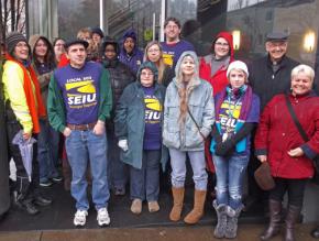 Workers protest outside the Bethesda Lutheran Communities offices in Portland, Ore.