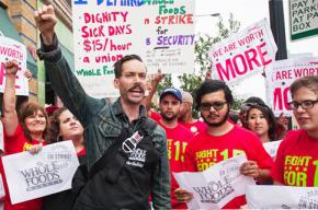 Workers on the picket line outside Whole Foods as part of the Fight for 15 campaign
