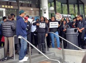 Members of the Black Student Union at UC Berkeley blockade a campus dining facility